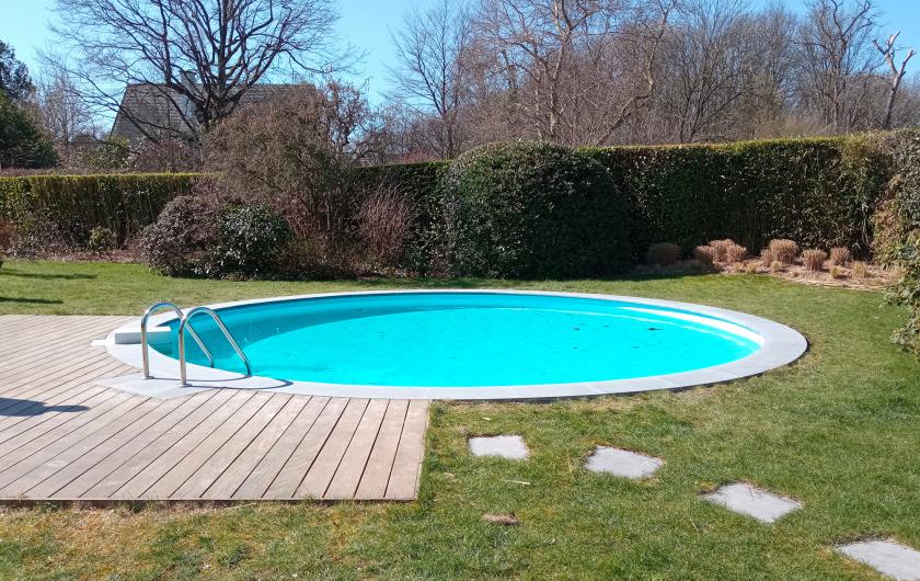 La piscine ronde avec terrasse bois